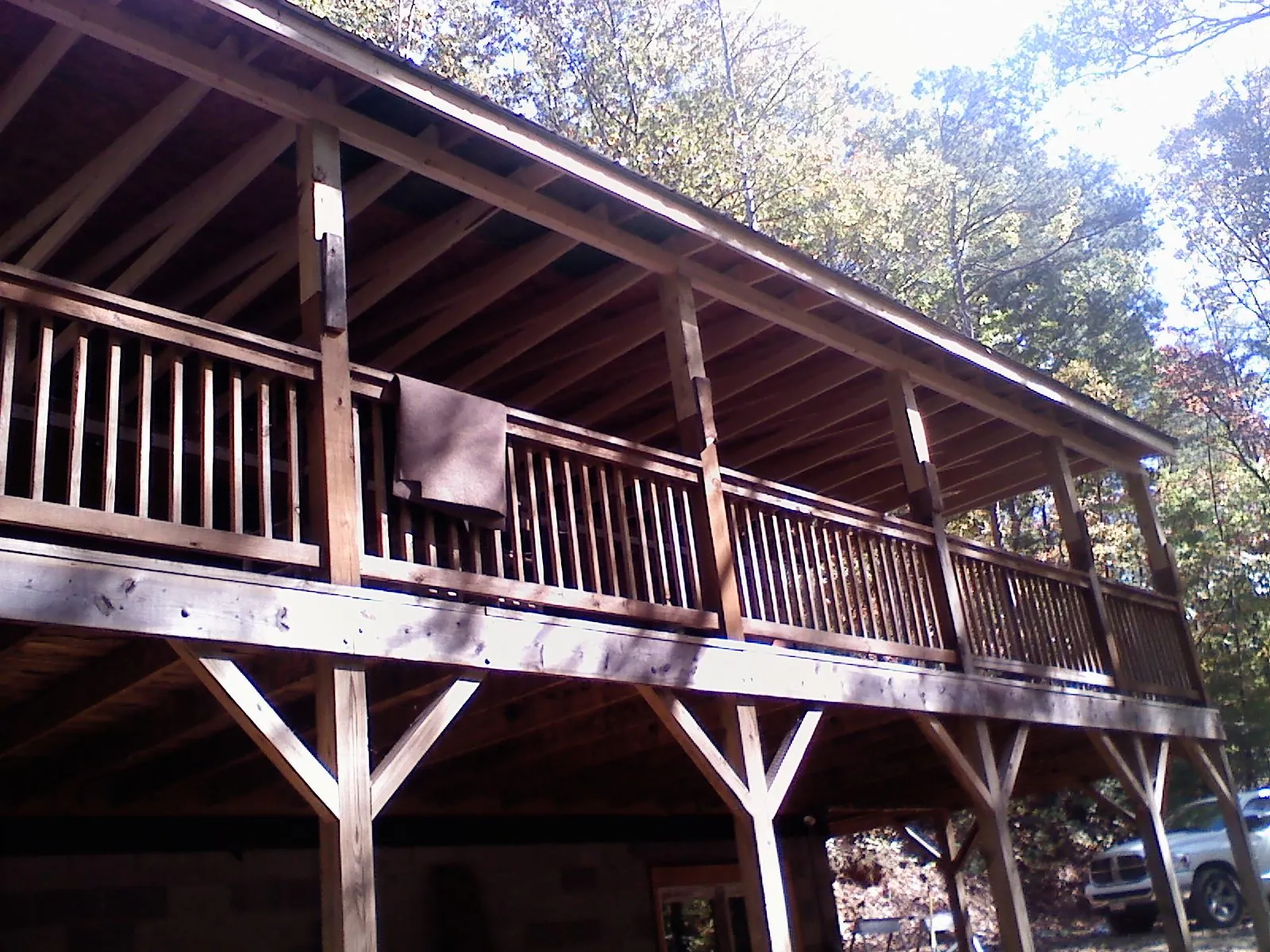 Timber framing under a new elevated porch and deck — Roof Leak Repair in Rockdale by Roofing Brothers